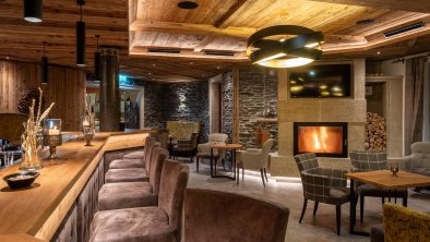 Hotel bar with open-hearth fireplace