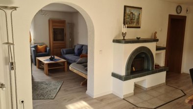 Living Area with Tiled Stove, © Haus Tholler