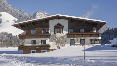 Appartementhaus Walchsee im Winter