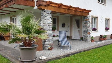 Terrace with entrance of the apartment