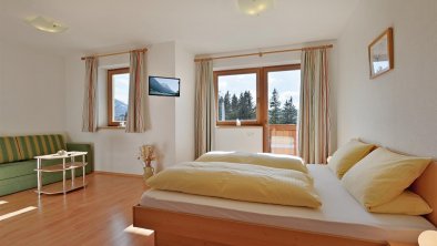 Scheffau_Bärnstatt_Schlafzimmer_WilderKaiser, © Berggasthof Bärnstatt/Hermann