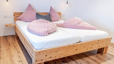 Bedroom with stone pine bed