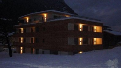 Apart Mountainlodge in Abenddämmerung