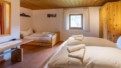 Schlafzimmer mit Dritter Bett