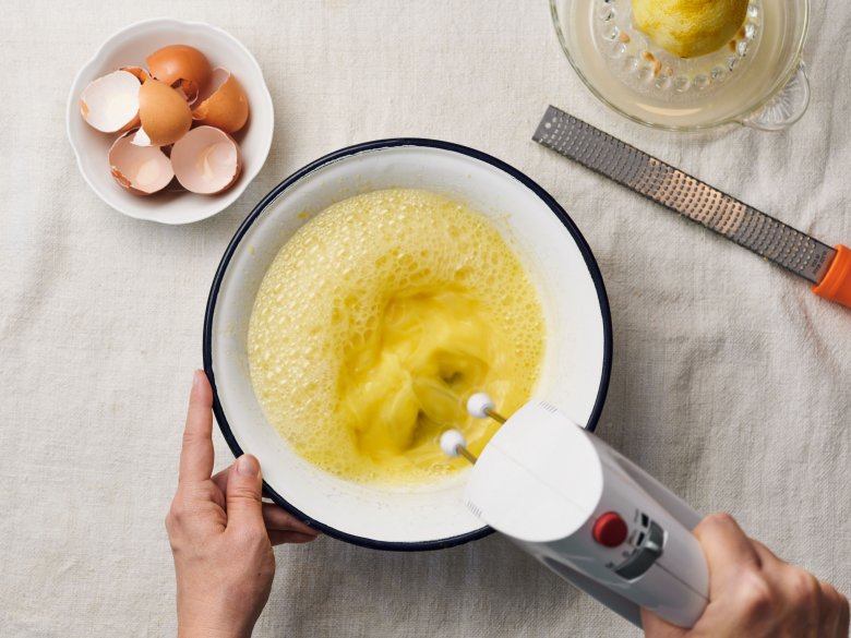 Step 2: Beat the egg whites with a hand mixer until stiff.