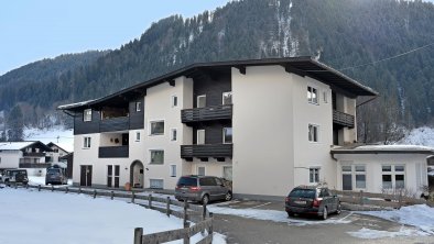 Alpen-Apartment-Soell-Ried-14-Haus-Winter