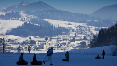 Kaiserwinkl-Urlaub-Winteraktivitaeten-Snowtubing, © TVB Kaiserwinkl