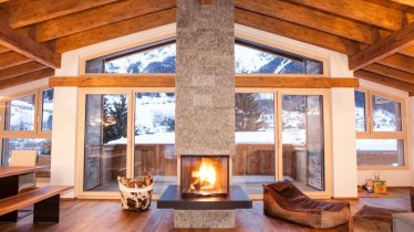 Fireplace after a day on the slopes, © Riffler Lodge