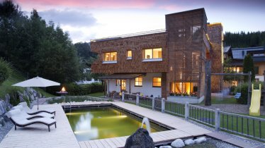 House with nature pool