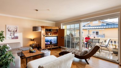 Living Room with sunny Balcony