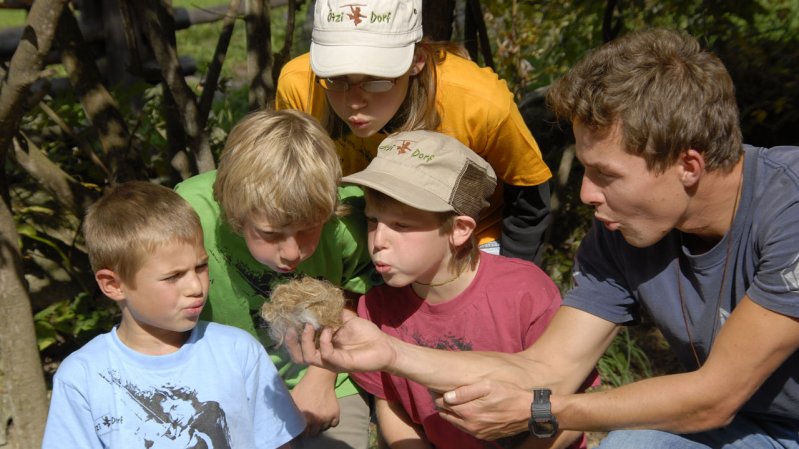 Try to make fire without using a lighter at Oetzi Village, © Ötzi-Dorf