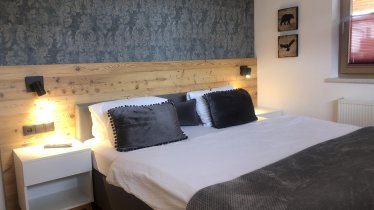 Schlafzimmer 2 mit Kachelofen