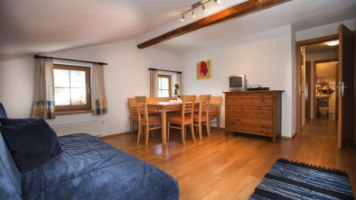 Living area with kitchen apartment Brennhütte