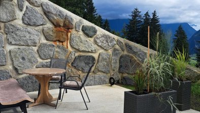 terrace with garden and mountain view