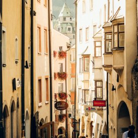 The winding lanes, punctuated by pastel-coloured townhouses and dotted by tiny shops and sidewalk cafes, are made for aimless ambling &ndash; the historic small town of Hall is a true cultural gem.&nbsp;, © Carlos Blanchard