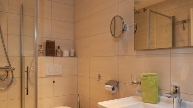 Shower/toilet from three-bed room