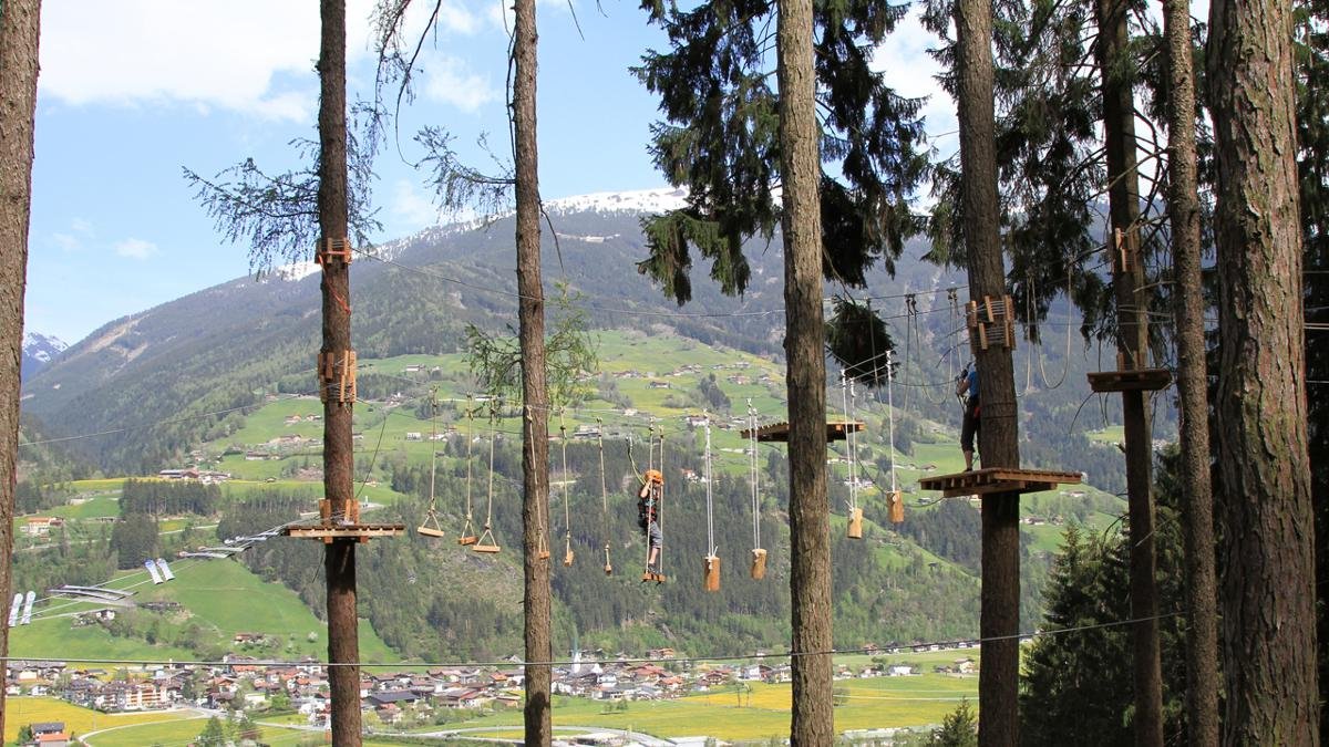 With its high rope obstacle course and via ferrata fixed-rope climbing route leading over a waterfall, the outdoor adventure park in Kaltenbach offers nerve-jangling experiences and a great day out for all the family., © Outdoorcenter-Zillertal