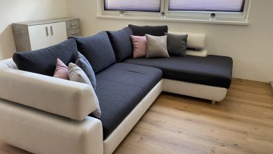 Wohnzimmer mit Schlafsofa