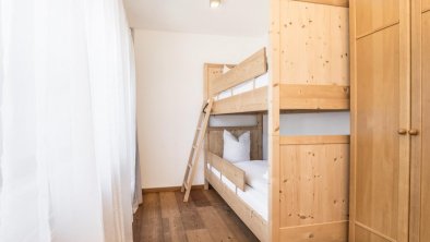 Children's room with bunk bed.