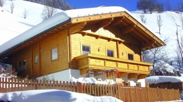 Holzblockhaus Bergkristall im Winter