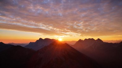 erste Sonne Roter Stein