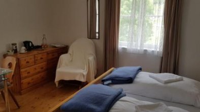 Direkt am Waldrand, ruhig gelegenes Doppelzimmer, © bookingcom