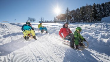 Rodeln am Schatzberg Winter Ski Juwel Alpbachtal W