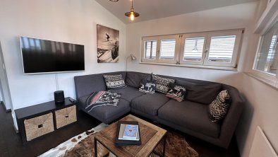 Comfortable living area with swiveling TV