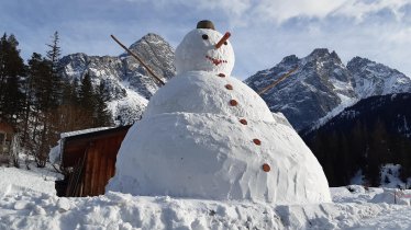 Haus Alpenglück - hauseigner Schneemann, © Alpenglück