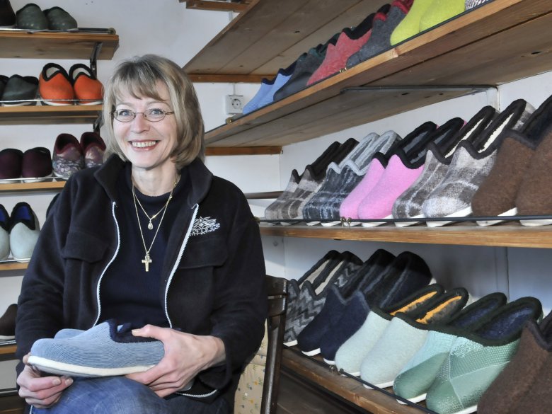 Frau Naschberger from Reith im Alpbachtal with a pair of her homemade &quot;Doggln&quot; slippers.