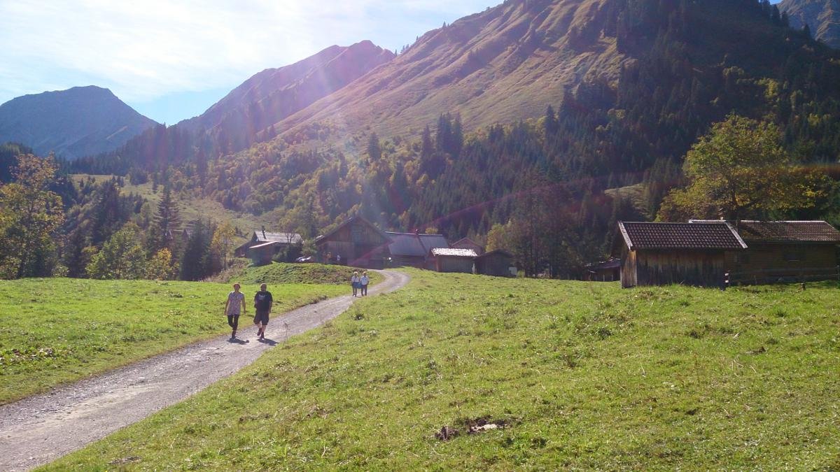 Hidden in a side valley and surrounded by lush green meadows, the village of Fallerschein is made up of 40 buildings, all of them solid wood huts, making it the largest settlement of its kind in Tirol. Hungry hikers can stop off here for a traditional meal., © Lechtal Tourismus/Anja Krämer